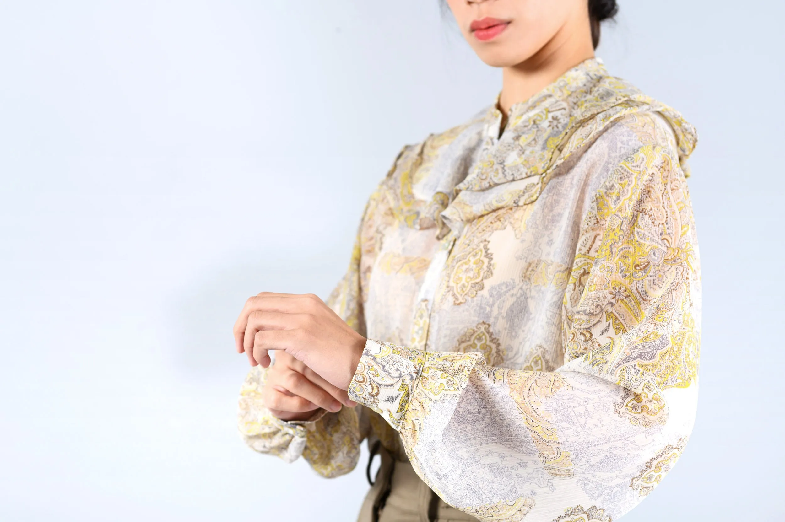 Yellow pattern blouse w/ peplum collars