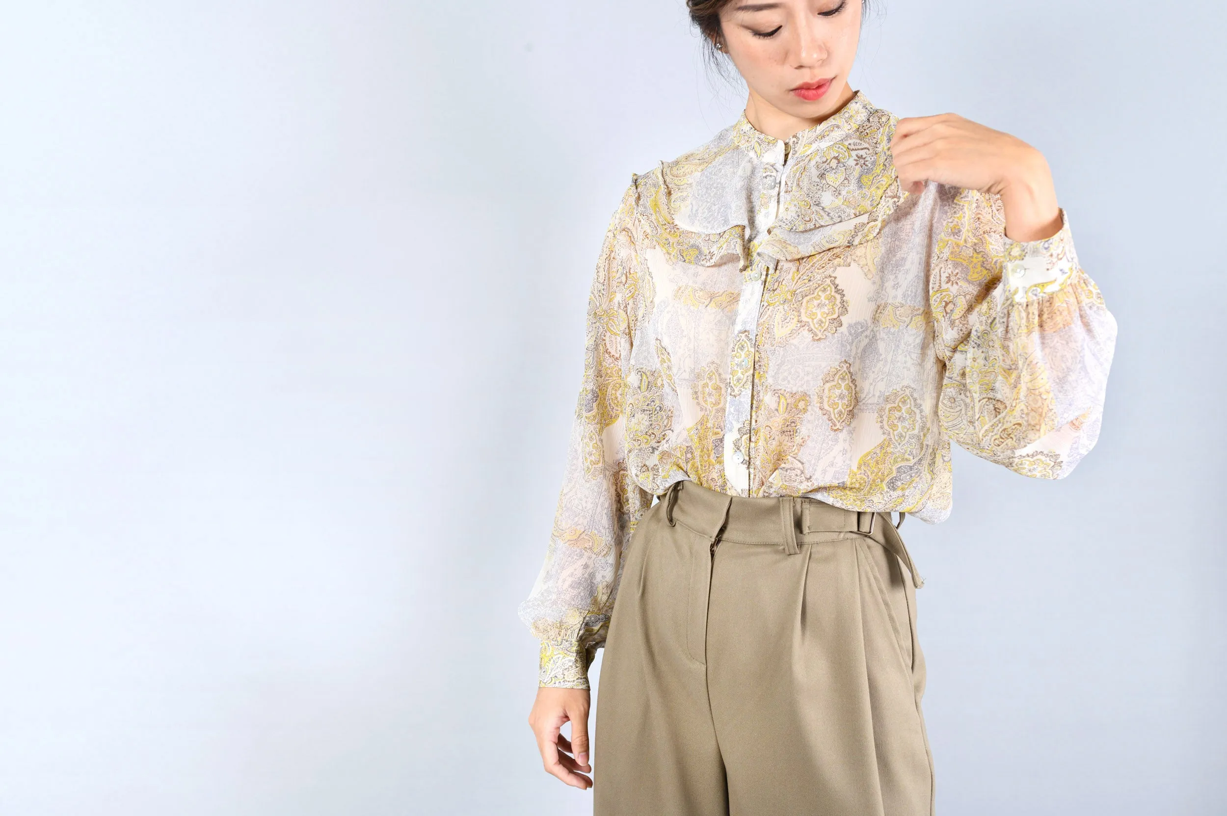 Yellow pattern blouse w/ peplum collars
